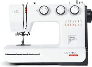 Bernette B35 Sewing Machine Swiss Design with 23 Stitches, 7 Presser Feet, Automatic Buttonhole, Quilting, Embroidery Kit, Heavy-Duty Build, Bobbins, Threader, LED Light, Portable, Extension Table