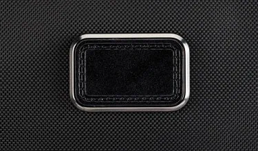 TUMI Alpha International Expandable 4-Wheel Carry-On