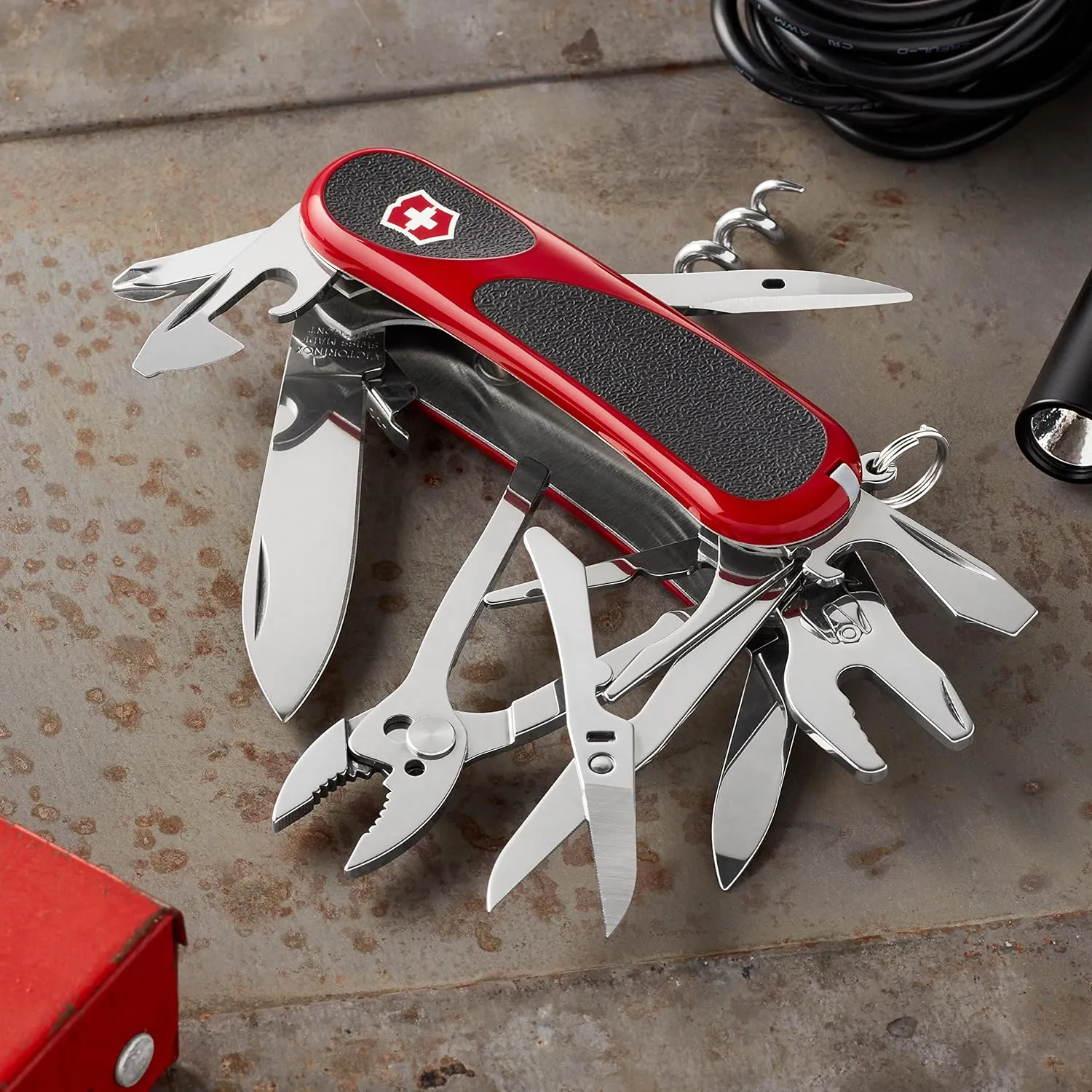 Victorinox Evolution S557 Grip Swiss Army Knife, 21 Functions, Swiss Made Pocket Knife with Large Blade, Screwdriver and Wire Stripper - Red/Black